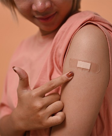 Photo of Immunization shot band-aid