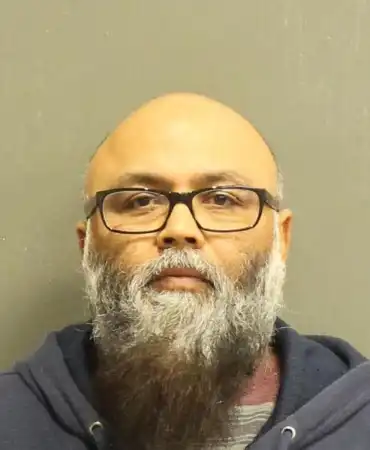 Imran Malik, 55