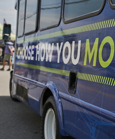 WeGo bus with Choose How You Move logo