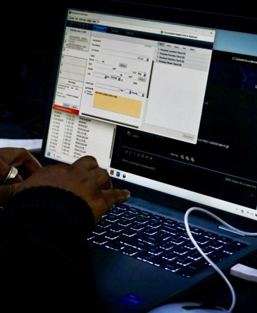 woman types on computer