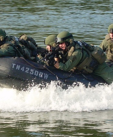 SWAT team members in boat