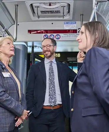 Mayor Freddie O'Connell and others riding a WeGo bus