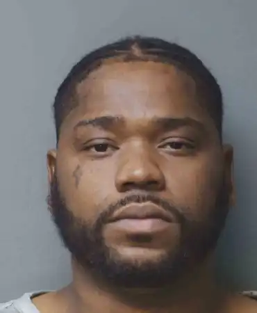David C. Travis, 37