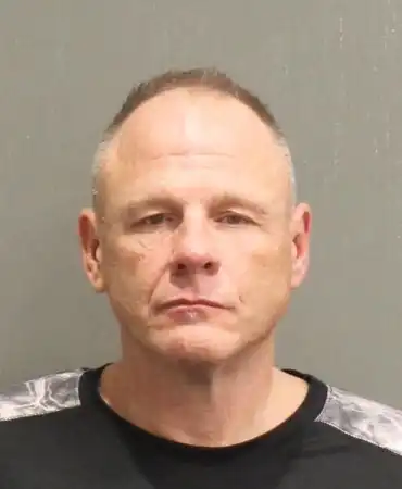 John M. Denton, 55
