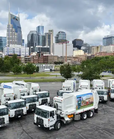 NWS new trucks with downtown Nashville skyline in background