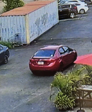 Maroon sedan